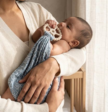 Runway geometric bamboo baby lovey by Shae & Palmer designed as a soft security blanket with pacifier holder.