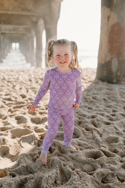 Shae & Palmer Runway Collection — modern bamboo toddler pajamas in bold purple geometric print. Two-piece pajama set for baby and toddler girls, soft, breathable, and perfect for stylish sleep or all-day play