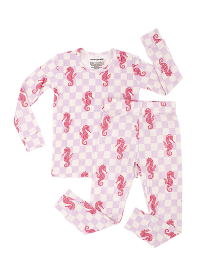 Seahorse Splash toddler bamboo pajamas by Shae & Palmer with coral pink seahorses on lavender checkerboard, ultra-soft breathable fabric