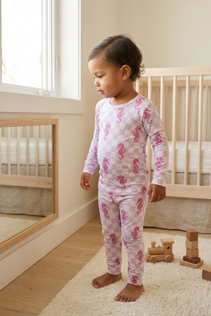 Soft bamboo toddler pajamas in Seahorse Splash print highlighting breathable and stretchy fabric texture