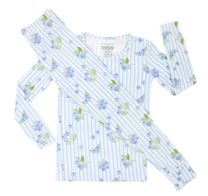 Shae & Palmer Blueberry Lane pajama set for toddlers — soft blue and white stripe bamboo fabric with a hand-painted blueberry print, long-sleeve top and pants laid flat