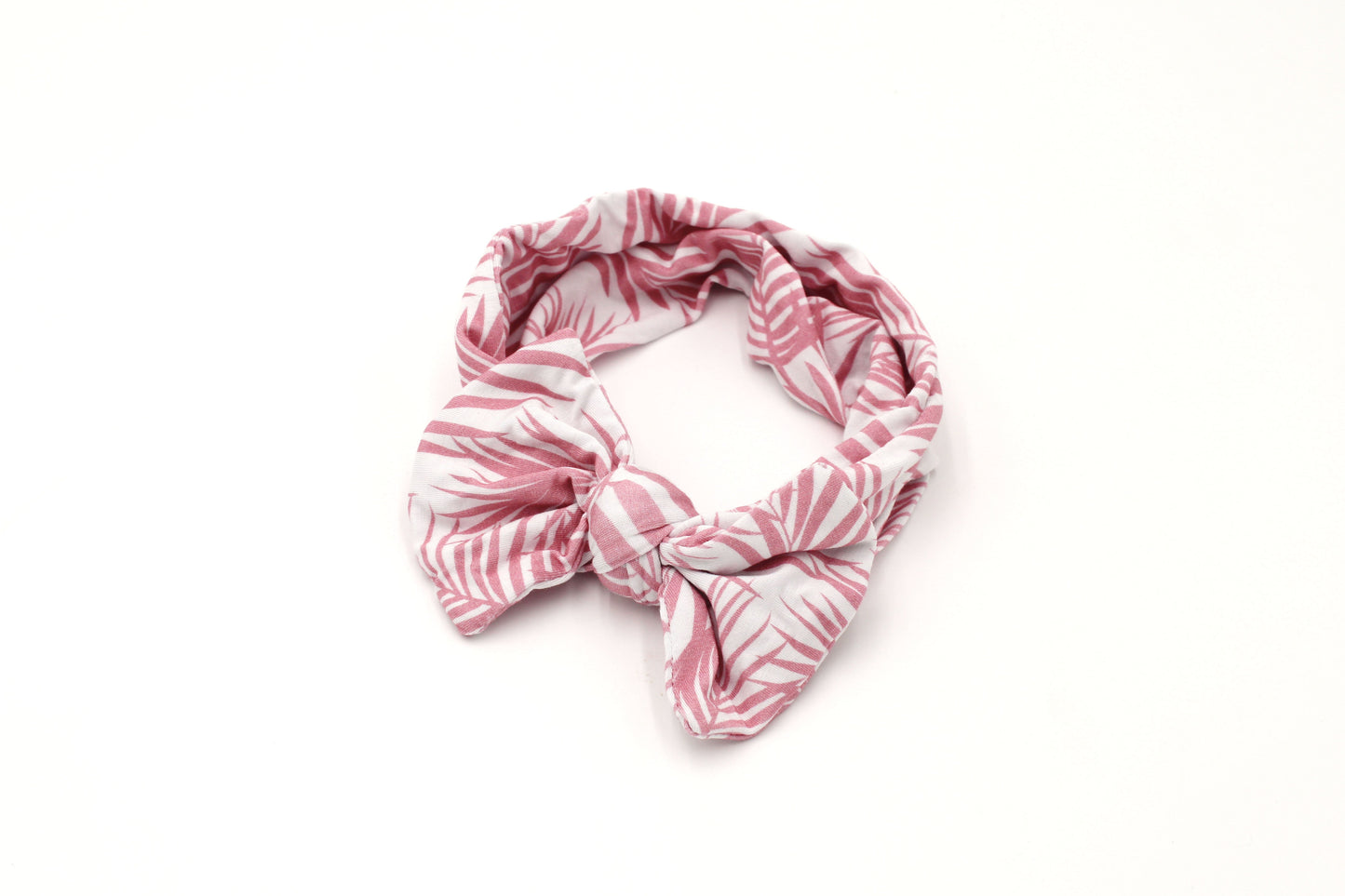 Shae & Palmer Cali Coastal Pink bamboo baby headband featuring soft pink palm leaf print.