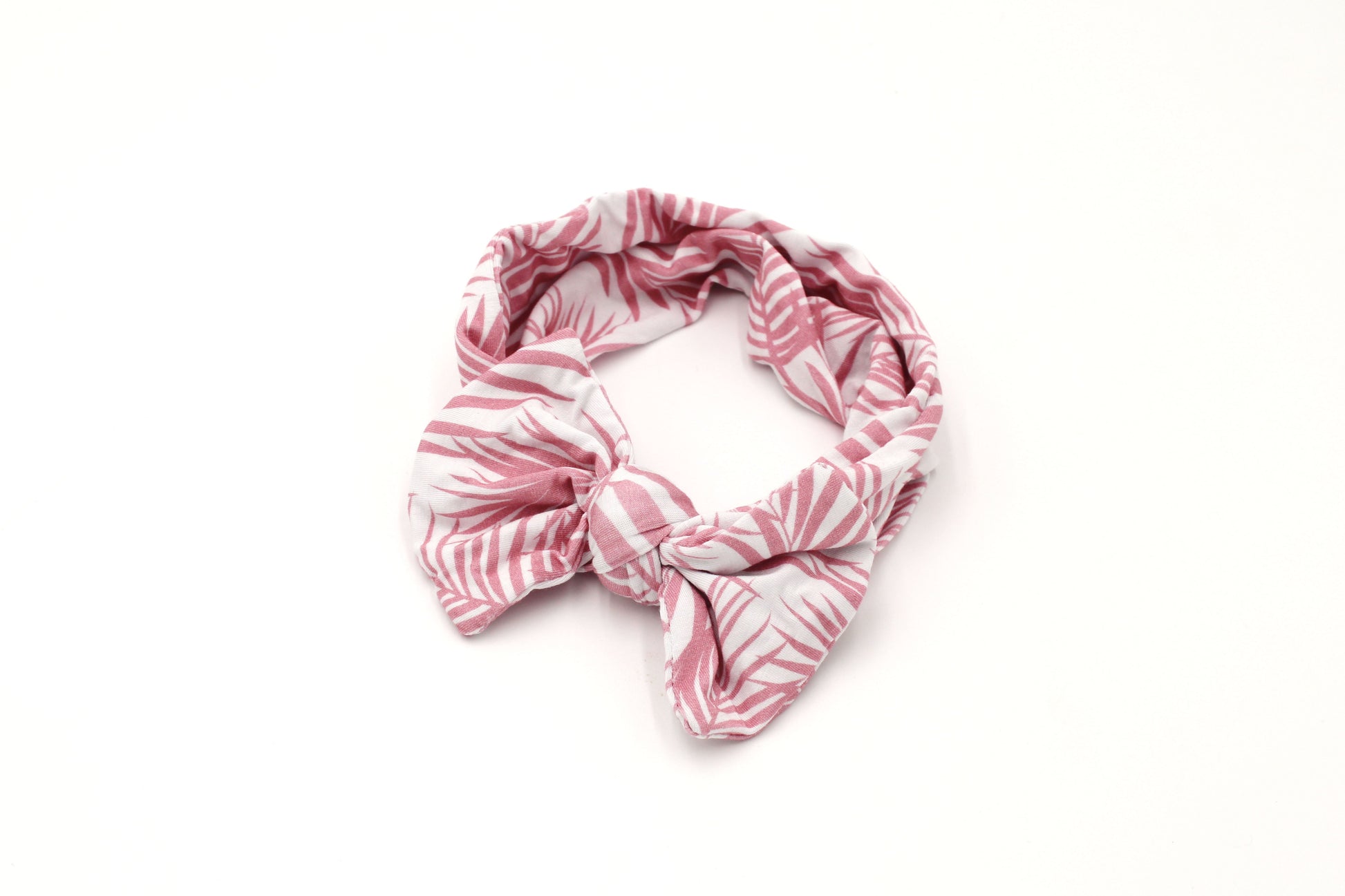 Shae & Palmer Cali Coastal Pink bamboo baby headband featuring soft pink palm leaf print.