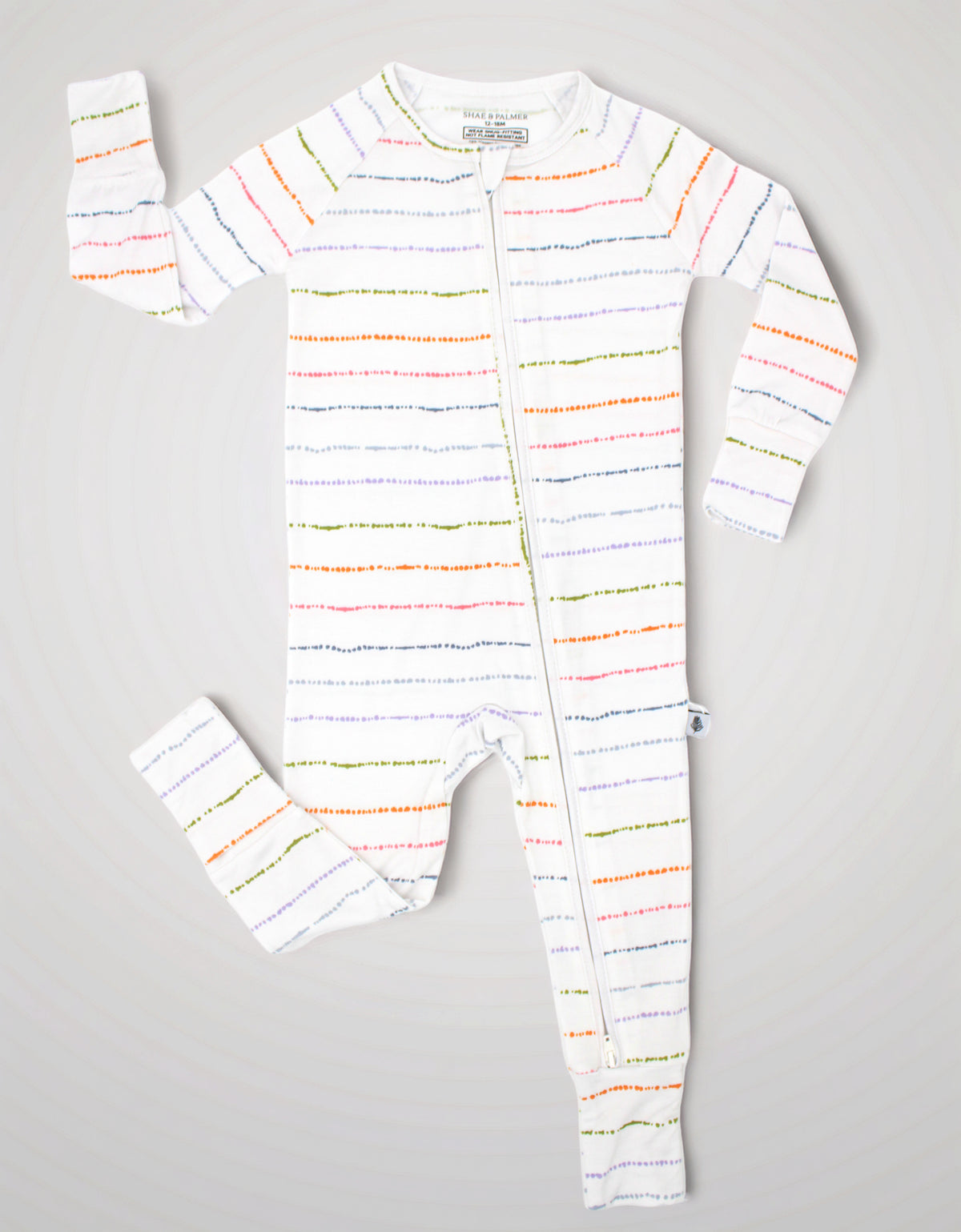 Confetti Stripe bamboo baby zipper romper from Shae & Palmer styled in a flat lay