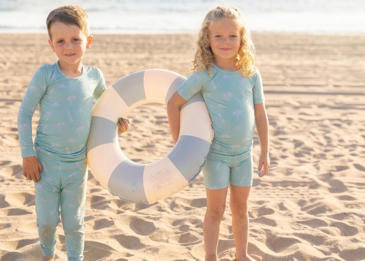 Big kids short sleeve and shorts bamboo pajama set in the Surfside Dreams print by Shae & Palmer with a relaxed coastal-inspired design.