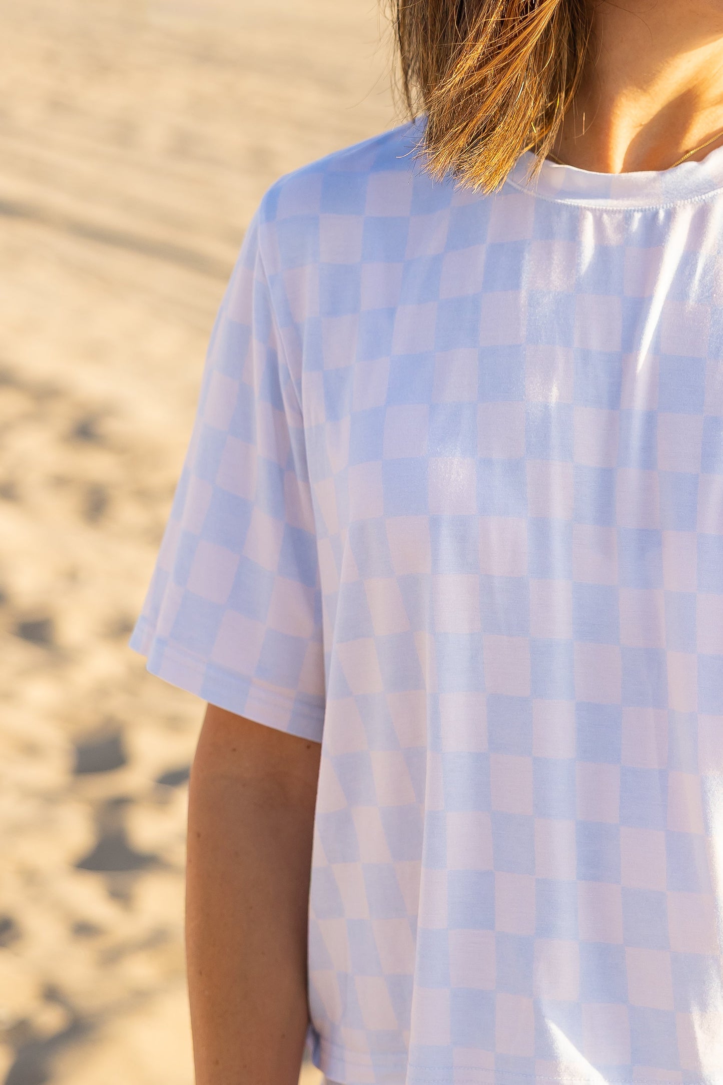 Women’s coastal Checkered Splash pajama set in blue by Shae & Palmer featuring a soft blue checker print and ultra-soft bamboo fabric