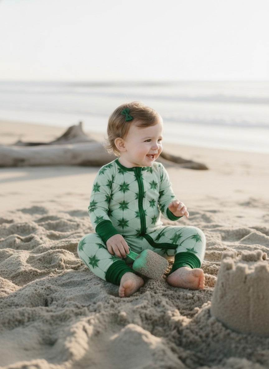 Starry Night Evergreen bamboo baby romper by Shae & Palmer with star print on deep green fabric, ultra-soft breathable material, double zipper design