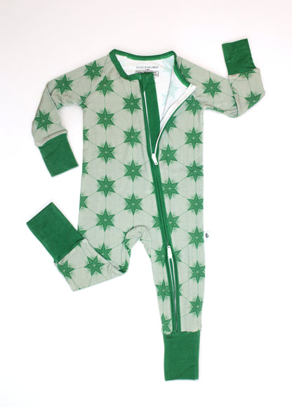 Baby wearing Starry Night Evergreen bamboo pajamas by Shae & Palmer, soft breathable temperature-regulating fabric with star print