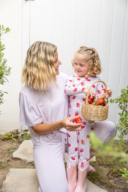 Mother and daughter in matching pink strawberry-print bamboo pajamas, mommy-and-me sleepwear set