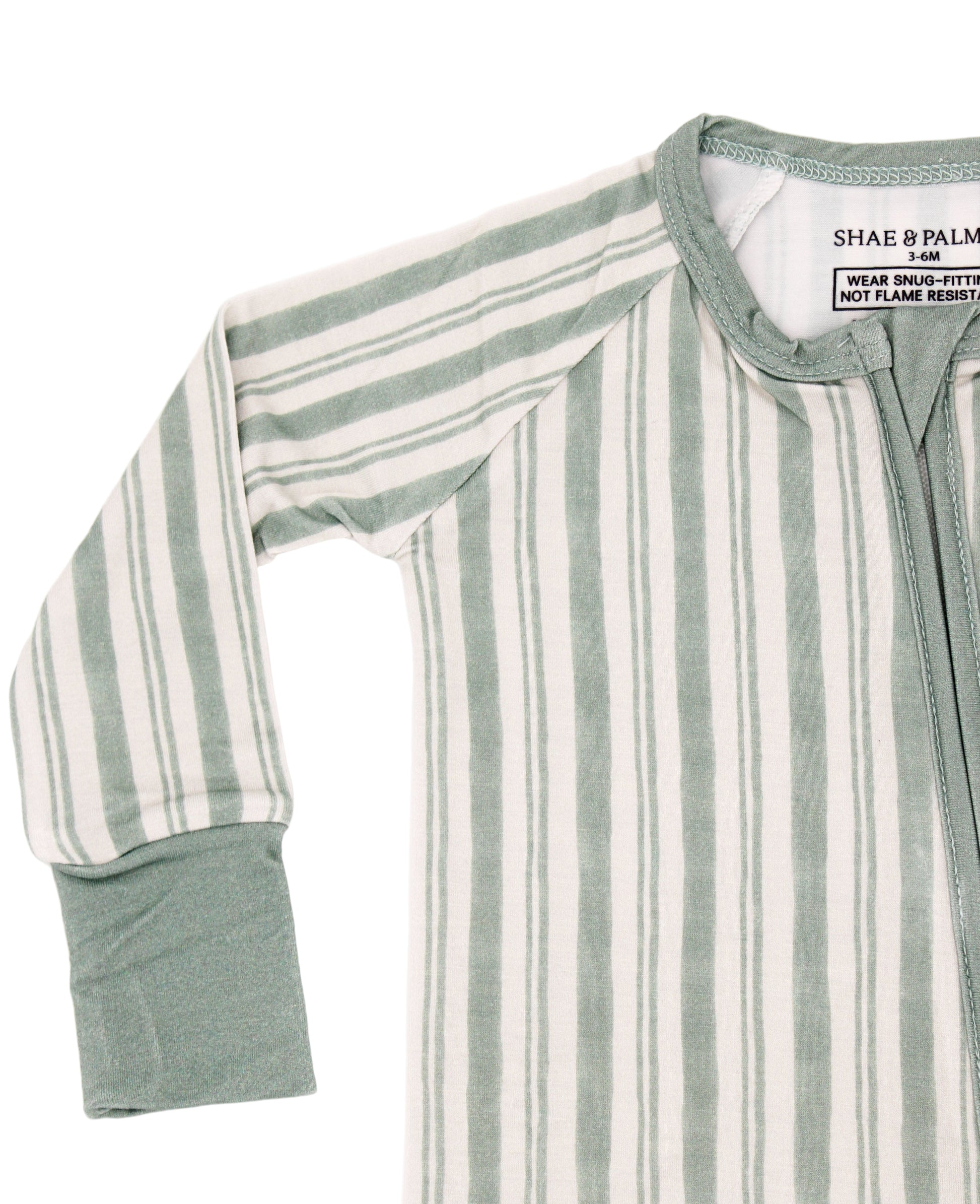 Shae & Palmer Studio Stripe Green bamboo baby pajamas with a modern stripe design, crafted for softness, sustainability, and functionality with a practical double-zip closure.