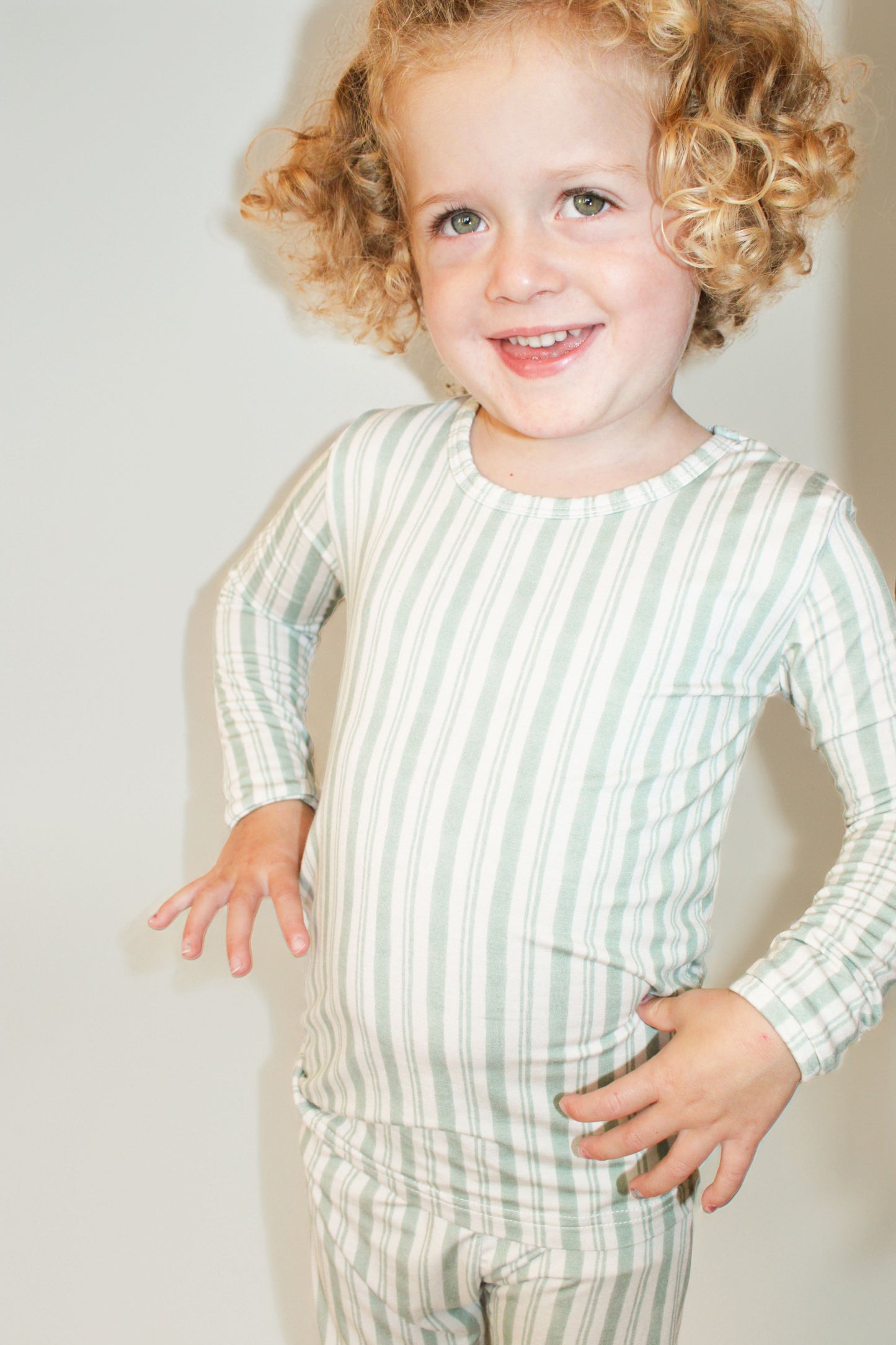 Shae & Palmer Studio Stripe Collection, bamboo toddler pajamas in Green Haze. Ultra-soft, breathable two-piece pajama set for baby and toddler, perfect for cozy sleep and all-day play.