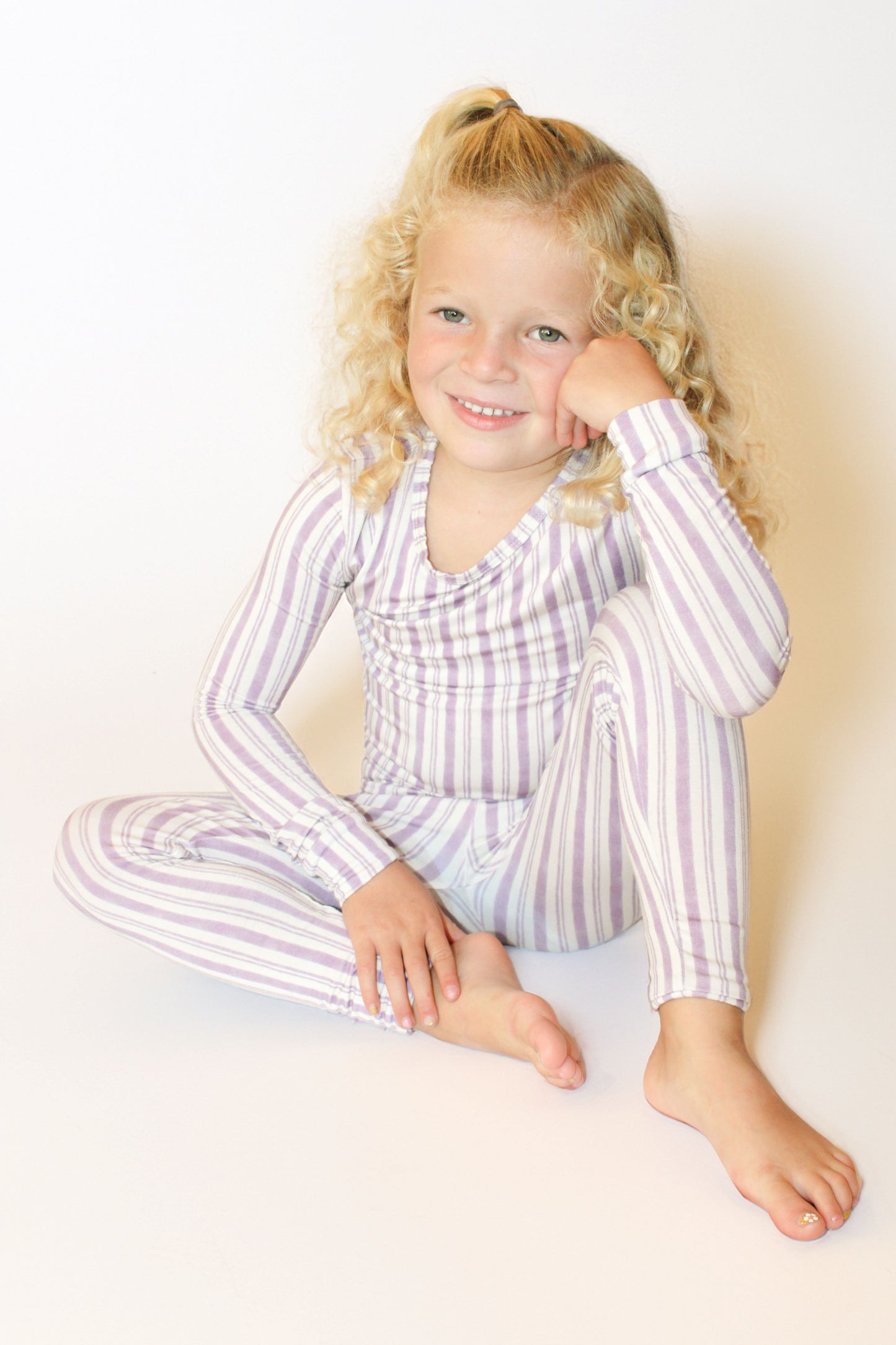 Shae & Palmer Studio Stripe Collection, bamboo toddler pajamas in Purple Haze. Ultra-soft, breathable two-piece pajama set for baby and toddler, perfect for cozy sleep and all-day play.