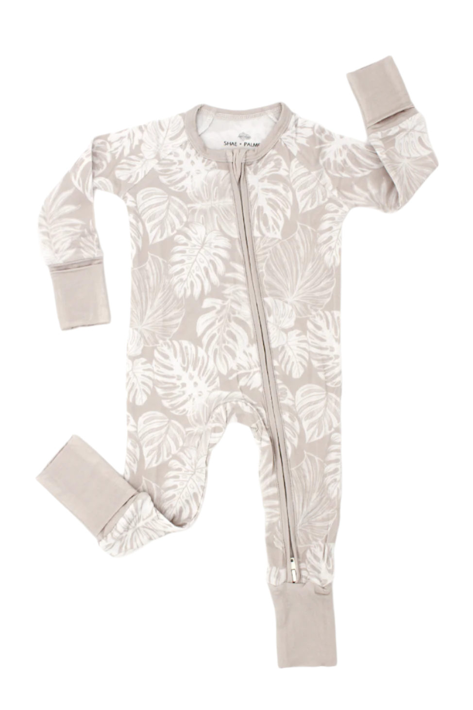 Shae & Palmer Tropical Bliss Collection - bamboo baby zip romper in Sandstone tropical floral print. Ultra-soft, breathable sleepwear with double zipper for easy diaper changes, perfect for baby girls in warmer weather