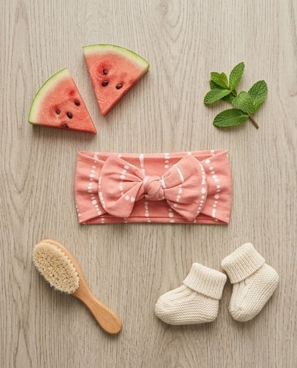Watermelon Blush bamboo baby headband paired with matching baby pajamas