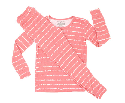Flat lay of Shae & Palmer Watermelon Blush Stripe bamboo two-piece toddler pajama set in soft pink stripes.